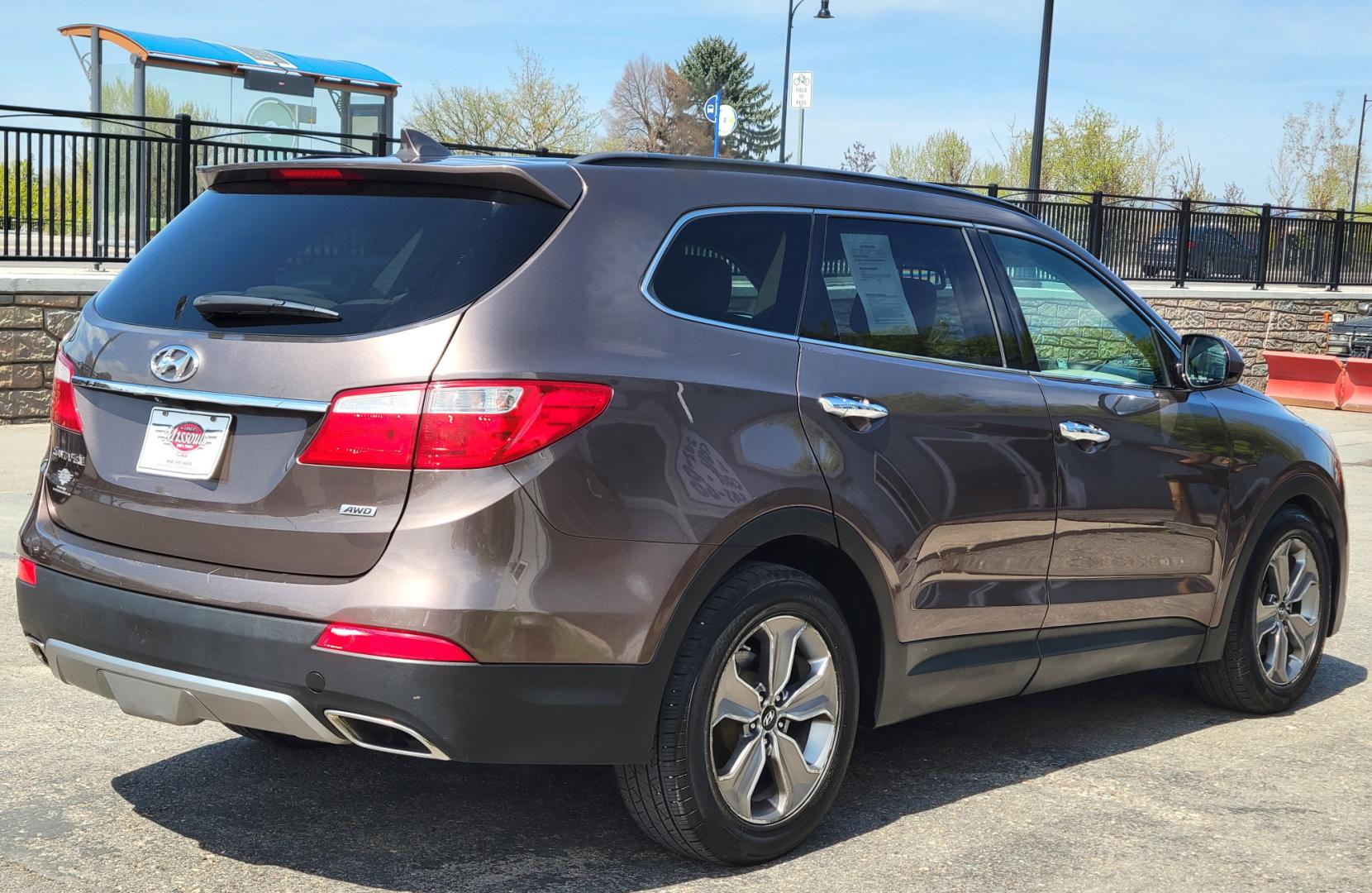 2015 Brown /Tan Hyundai Santa Fe GLS (KM8SMDHF7FU) with an 3.3L V6 engine, 6 Speed Auto transmission, located at 450 N Russell, Missoula, MT, 59801, (406) 543-6600, 46.874496, -114.017433 - Great Running AWD SUV. 3.3L V6 Engine. 6 Speed Automatic Transmission. 3rd Row Seating. Heated Front Seats. Power Drivers Seat. Backup Camera. AM FM XM CD. Bluetooth. Newer Continental Tires from Les Schwab. New Brakes. Air. Cruise. Tilt. Power Windows and Locks. - Photo#3